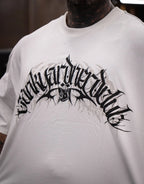 Model wearing graphic off-white t-shirt with bold black print design