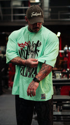 Model wearing casual black pants in gym setting, showing urban activewear style